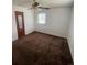 Bedroom featuring neutral paint, window and coordinating carpet at 1132 Moline St, Aurora, CO 80010