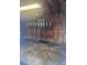 Spacious garage with wood walls, offering ample storage and parking space for your vehicles at 1132 Moline St, Aurora, CO 80010