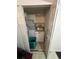 Laundry room featuring a washer, dryer and white cabinets at 1132 Moline St, Aurora, CO 80010
