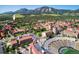 An aerial view showing the property's proximity to the University of Colorado's campus and Folsom Field, with the Flatirons in the background at 850 20Th St # 203, Boulder, CO 80302