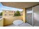 Balcony with a table and chairs, and a view of the neighborhood and a mountain at 850 20Th St # 203, Boulder, CO 80302