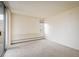 Bedroom features neutral carpet, a sliding glass door to a balcony, and a window at 850 20Th St # 203, Boulder, CO 80302