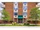 The entrance to San Marco North building has an inviting facade with lush greenery and well-kept surroundings at 850 20Th St # 203, Boulder, CO 80302