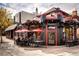 The Sink restaurant and bar with an outdoor seating area, set along a sidewalk with other businesses at 850 20Th St # 203, Boulder, CO 80302