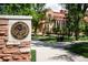 University of Colorado seal on a stone pillar, beside a walkway leading to the campus buildings at 850 20Th St # 203, Boulder, CO 80302