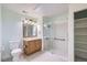 Bathroom featuring a glass enclosed shower, vanity and toilet at 5537 Lewis Ct # 4, Arvada, CO 80002