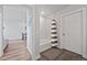 Simple bathroom with tub shower, tile flooring, and a view to the dining area at 20 Wilcox St # 312, Castle Rock, CO 80104