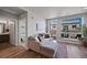 Living room with comfortable sectional sofa and access to bedroom and bath at 20 Wilcox St # 312, Castle Rock, CO 80104