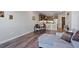 Cozy living room with an open floorplan to a modern kitchen and dining area at 20 Wilcox St # 312, Castle Rock, CO 80104
