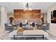 Lobby with stylish seating and a unique wood feature wall at 20 Wilcox St # 312, Castle Rock, CO 80104