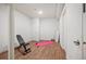 Simple workout room with wood flooring, bench, yoga mat, and ample open space at 9007 E 60Th Ave, Denver, CO 80238