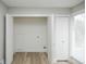 Spacious closet with light wood-look floors and a bright window at 740 Moline St, Aurora, CO 80010
