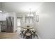 Cozy dining area adjacent to kitchen features modern decor and plenty of natural light at 740 Moline St, Aurora, CO 80010