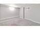 Finished basement with neutral walls and carpet, offering a clean and versatile space at 1226 Clayton St, Denver, CO 80206