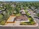 An aerial view showcases the home's layout, fenced yard, and surrounding neighborhood with mature trees at 7380 Utica St, Westminster, CO 80030