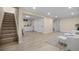 Finished basement with new flooring, ample storage, and a bar area; ideal for entertaining or relaxing at 7380 Utica St, Westminster, CO 80030