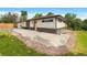 Charming single-story home with a neutral color scheme, a spacious front yard, and a freshly poured concrete patio at 7380 Utica St, Westminster, CO 80030