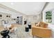 Open-concept living area connecting the kitchen and living spaces, perfect for modern living and entertaining at 7380 Utica St, Westminster, CO 80030