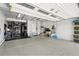 Well-organized garage with ample storage space, gym equipment, and easy access for vehicles at 5077 W 108Th Cir, Westminster, CO 80031