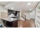 Modern kitchen featuring stainless steel appliances, granite countertops, and a stylish backsplash at 5077 W 108Th Cir, Westminster, CO 80031