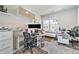 Office space with a sleek desk setup, ergonomic chair, and bright natural lighting at 522 Meridian Ln, Superior, CO 80027