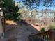 Backyard view from deck with wooden fence and patio at 3824 S Quemoy Way, Aurora, CO 80018