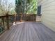 A view of a deck with a wooden railing and brown planks at 3824 S Quemoy Way, Aurora, CO 80018