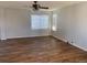 Spacious living room with hardwood floors and natural light at 3824 S Quemoy Way, Aurora, CO 80018