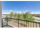 Scenic balcony providing a serene outdoor retreat with expansive views of lush greenery and open skies, perfect for relaxation at 4795 E 98Th Pl, Thornton, CO 80229