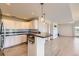 Modern kitchen featuring sleek countertops, stainless steel appliances, and an open design, perfect for entertaining at 4795 E 98Th Pl, Thornton, CO 80229