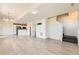 Open-concept living area with modern flooring, neutral walls, and plenty of natural light, creating a comfortable space at 4795 E 98Th Pl, Thornton, CO 80229