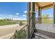 Inviting porch offering scenic views from elevated steps and stone accents at 4795 E 98Th Pl, Thornton, CO 80229