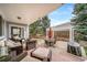 Charming back patio offering comfortable seating and outdoor dining, perfect for entertaining at 12136 Desert Hills St, Parker, CO 80138