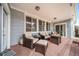 Inviting covered back patio with comfortable seating, ideal for relaxation and outdoor enjoyment at 12136 Desert Hills St, Parker, CO 80138