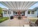 Backyard patio featuring a pergola, outdoor seating, and well-manicured lawn for relaxation at 12136 Desert Hills St, Parker, CO 80138