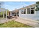 Spacious backyard with a ramp, patio, pergola, seating area, and green lawn for outdoor enjoyment at 12136 Desert Hills St, Parker, CO 80138