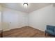 Cozy bedroom with wood floors, and neutral walls, and closets for storage at 12136 Desert Hills St, Parker, CO 80138