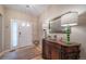 Welcoming entryway featuring stylish decor, hardwood floors, and a bright, airy atmosphere at 12136 Desert Hills St, Parker, CO 80138