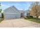 Charming two-story home with a well-maintained lawn and a two-car garage, perfect for Gathering living at 12136 Desert Hills St, Parker, CO 80138