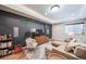 Living area featuring a decorative wall, recessed lighting, and comfortable seating at 12136 Desert Hills St, Parker, CO 80138