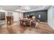 Spacious living room with kitchenette featuring comfortable seating, and stylish decor at 12136 Desert Hills St, Parker, CO 80138