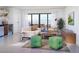 Cozy living room with a patio view, modern furniture, and stylish decor at 2758 Utica St, Denver, CO 80212