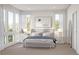 Serene main bedroom with large windows, neutral decor, and a comfortable seating area at 2758 Utica St, Denver, CO 80212