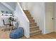 Contemporary home office space with a staircase, workstation, and a cozy beanbag chair at 2758 Utica St, Denver, CO 80212