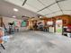 Spacious garage featuring work bench and work-out area at 675 S Quivas St, Denver, CO 80223