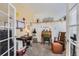 Bright and inviting sewing room features natural light, a charming sewing table, and decor at 6694 S Rome St, Aurora, CO 80016