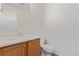 Half bath with a sink and a toilet is located on the main floor at 19466 E 59Th Dr, Aurora, CO 80019