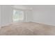 Spacious empty bedroom features natural light and neutral tones at 19466 E 59Th Dr, Aurora, CO 80019
