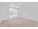 Spacious empty bedroom features natural light and neutral tones at 19466 E 59Th Dr, Aurora, CO 80019