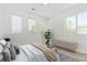 Light filled bedroom with bright windows and stylish décor at 19466 E 59Th Dr, Aurora, CO 80019